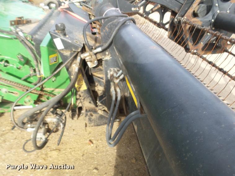 image for item DB1780 1999 MacDon 972 draper head