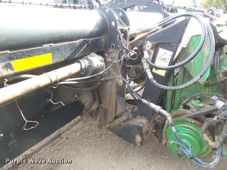 image for item DB1780 1999 MacDon 972 draper head