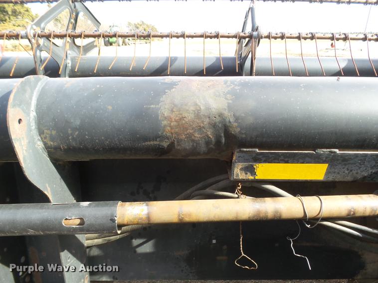 image for item DB1780 1999 MacDon 972 draper head