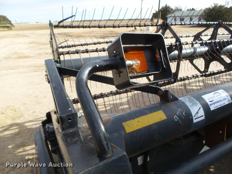 image for item DB1780 1999 MacDon 972 draper head