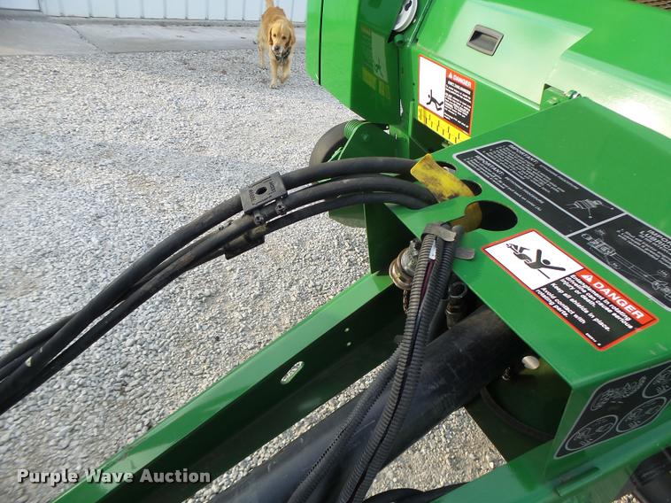 image for item K5524 2013 John Deere 569 Premium round baler