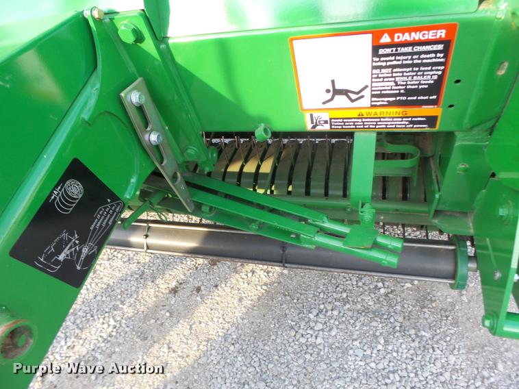 image for item K5524 2013 John Deere 569 Premium round baler