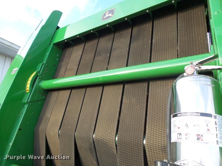 image for item K5524 2013 John Deere 569 Premium round baler