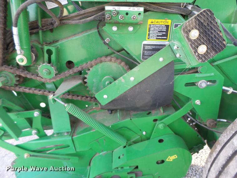 image for item K5524 2013 John Deere 569 Premium round baler