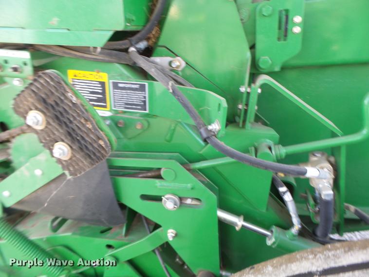 image for item K5524 2013 John Deere 569 Premium round baler