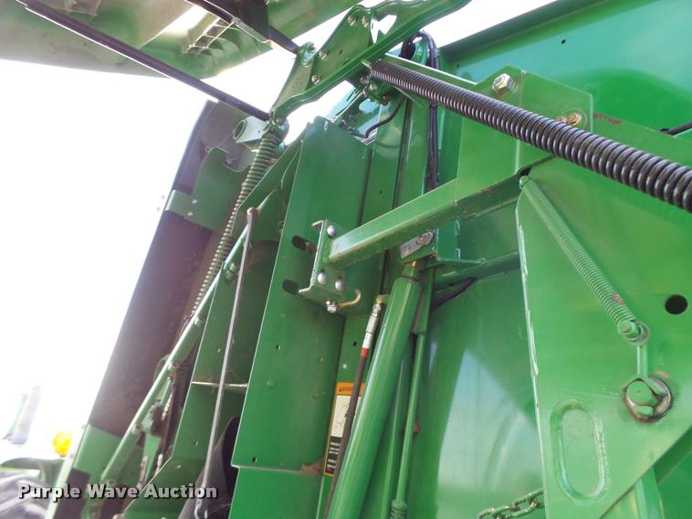 image for item K5524 2013 John Deere 569 Premium round baler