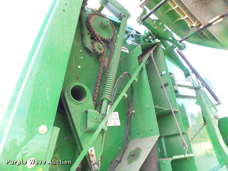 image for item K5524 2013 John Deere 569 Premium round baler