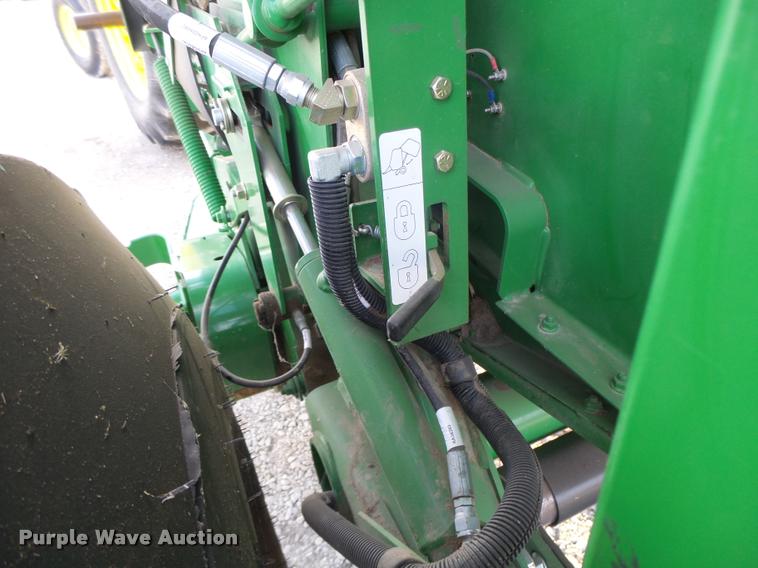 image for item K5524 2013 John Deere 569 Premium round baler