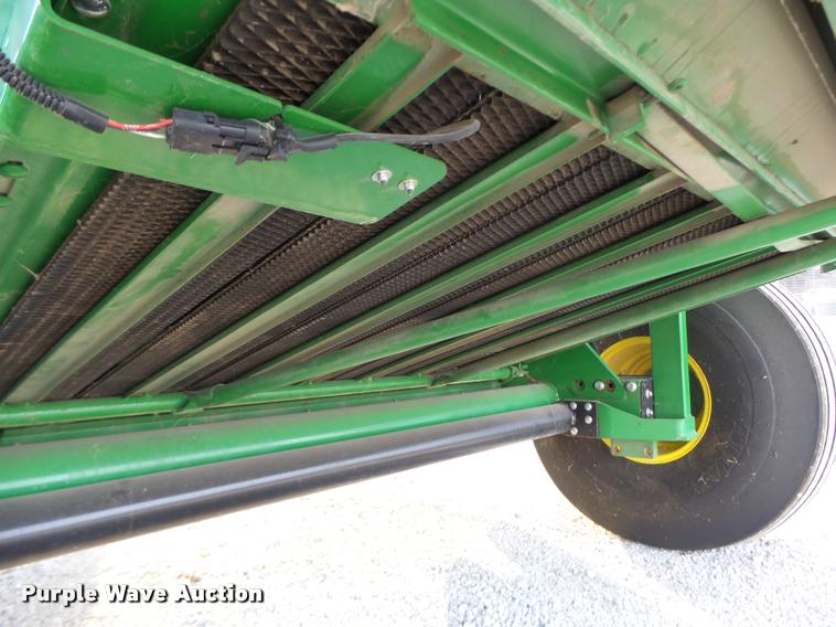 image for item K5524 2013 John Deere 569 Premium round baler