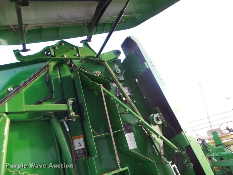 image for item K5524 2013 John Deere 569 Premium round baler