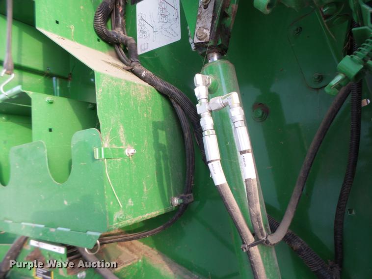 image for item K5524 2013 John Deere 569 Premium round baler