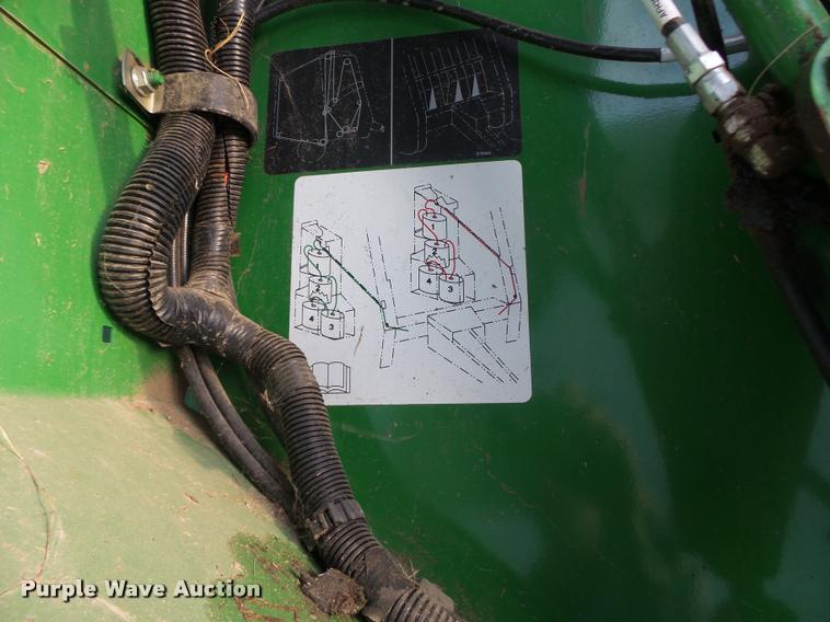 image for item K5524 2013 John Deere 569 Premium round baler