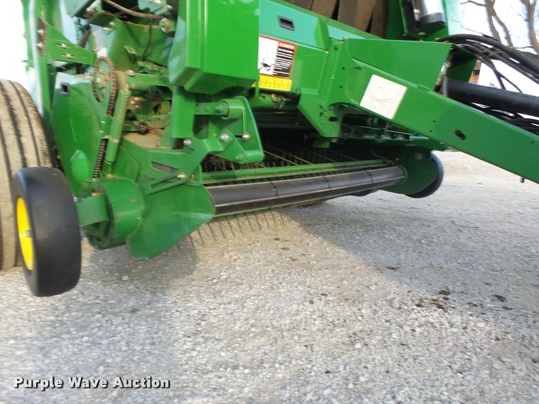 image for item K5524 2013 John Deere 569 Premium round baler