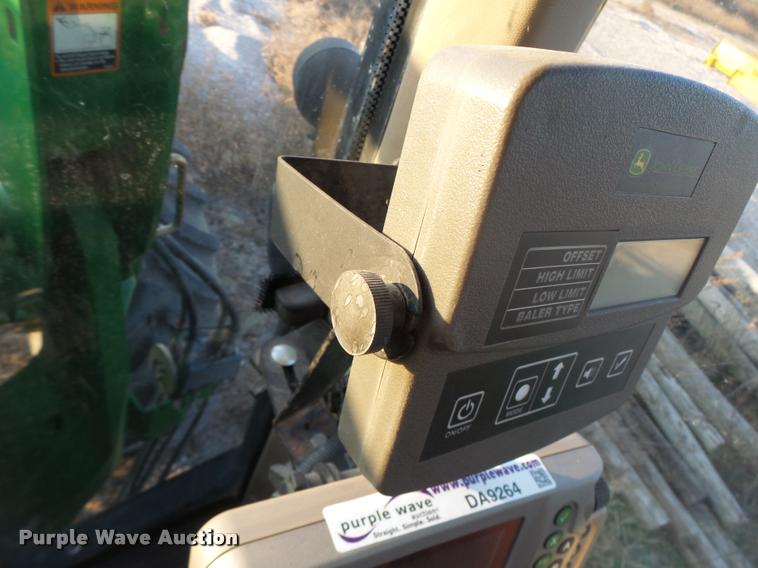 image for item K5524 2013 John Deere 569 Premium round baler