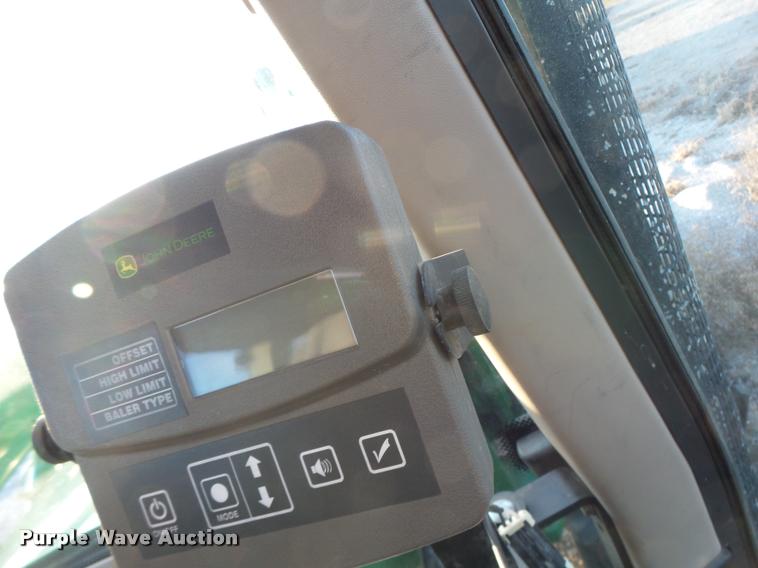 image for item K5524 2013 John Deere 569 Premium round baler