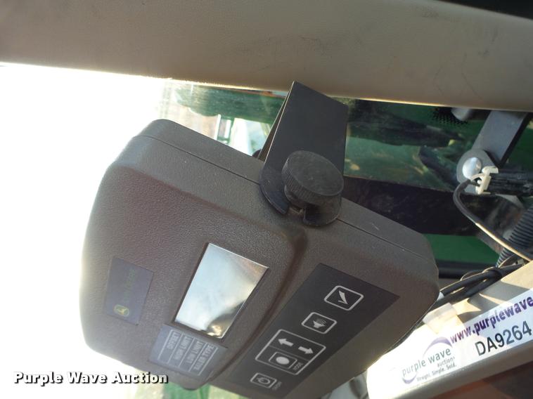 image for item K5524 2013 John Deere 569 Premium round baler