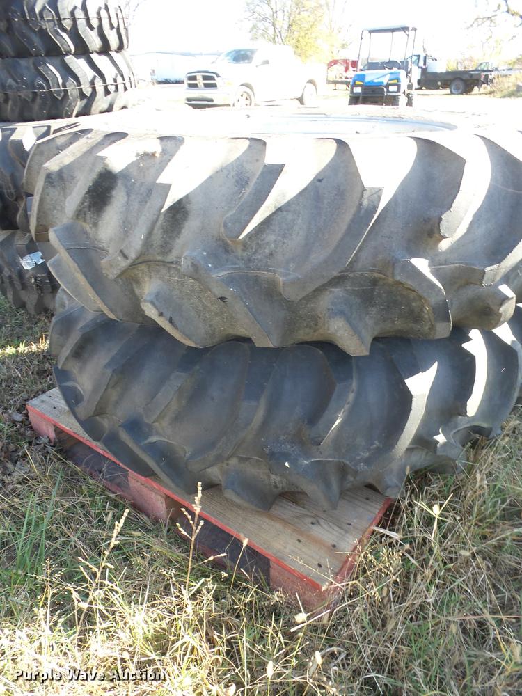 image for item AG9116 (2) Goodyear 14.9-28 ag tires and wheels