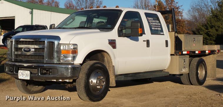 image for item AX9039 2008 Ford F350 Super Duty Crew Cab flatbed pickup truck