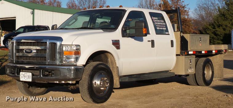 image for item AX9039 2008 Ford F350 Super Duty Crew Cab flatbed pickup truck