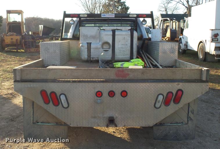 image for item AX9039 2008 Ford F350 Super Duty Crew Cab flatbed pickup truck