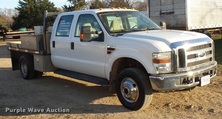 image for item AX9039 2008 Ford F350 Super Duty Crew Cab flatbed pickup truck