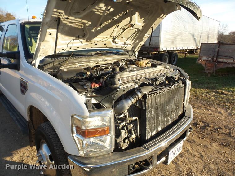 image for item AX9039 2008 Ford F350 Super Duty Crew Cab flatbed pickup truck