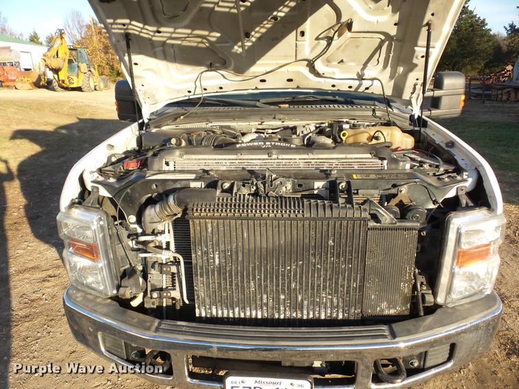 image for item AX9039 2008 Ford F350 Super Duty Crew Cab flatbed pickup truck