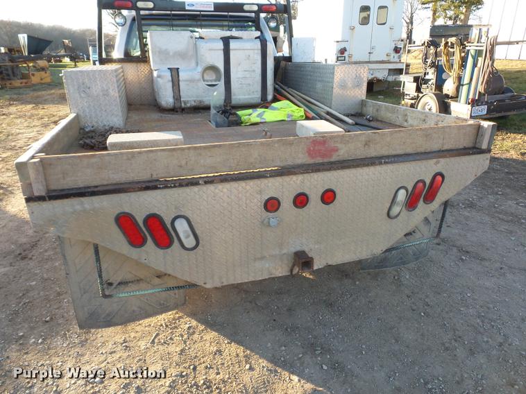 image for item AX9039 2008 Ford F350 Super Duty Crew Cab flatbed pickup truck