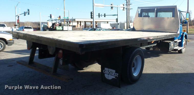image for item AX9047 2002 Freightliner FL60 flatbed truck