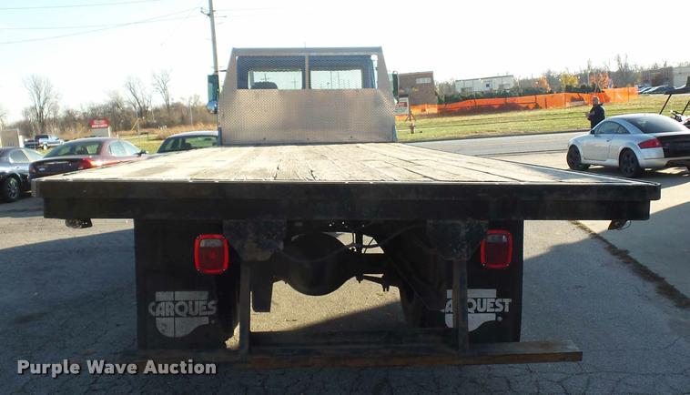 image for item AX9047 2002 Freightliner FL60 flatbed truck