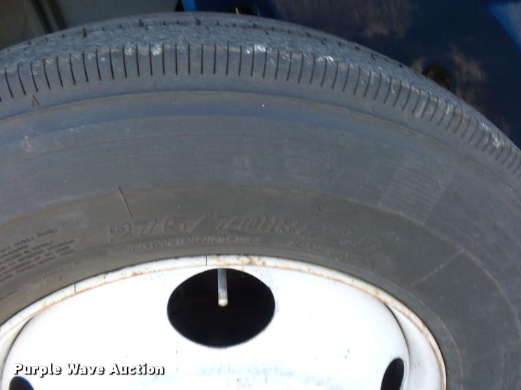 image for item AX9047 2002 Freightliner FL60 flatbed truck