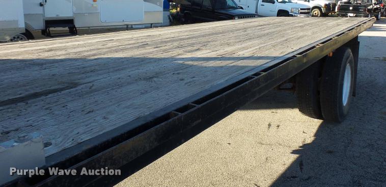 image for item AX9047 2002 Freightliner FL60 flatbed truck