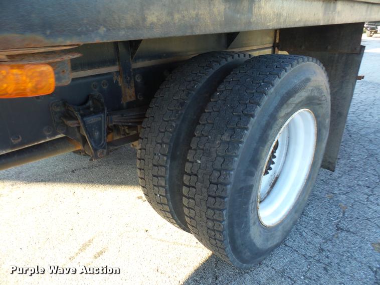 image for item AX9047 2002 Freightliner FL60 flatbed truck