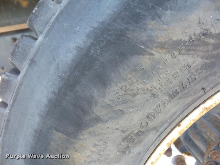 image for item AX9047 2002 Freightliner FL60 flatbed truck