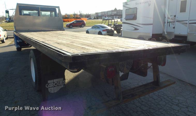 image for item AX9047 2002 Freightliner FL60 flatbed truck