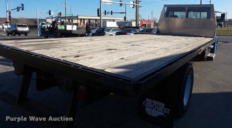 image for item AX9047 2002 Freightliner FL60 flatbed truck