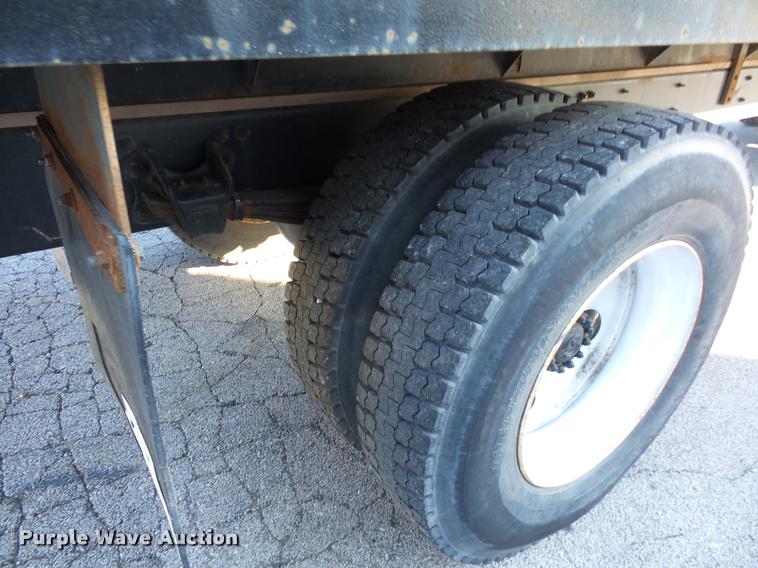 image for item AX9047 2002 Freightliner FL60 flatbed truck