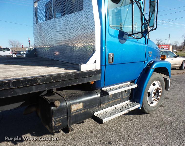 image for item AX9047 2002 Freightliner FL60 flatbed truck