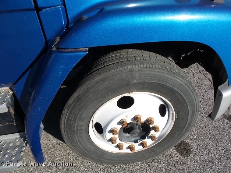 image for item AX9047 2002 Freightliner FL60 flatbed truck