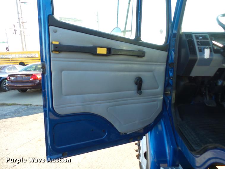 image for item AX9047 2002 Freightliner FL60 flatbed truck