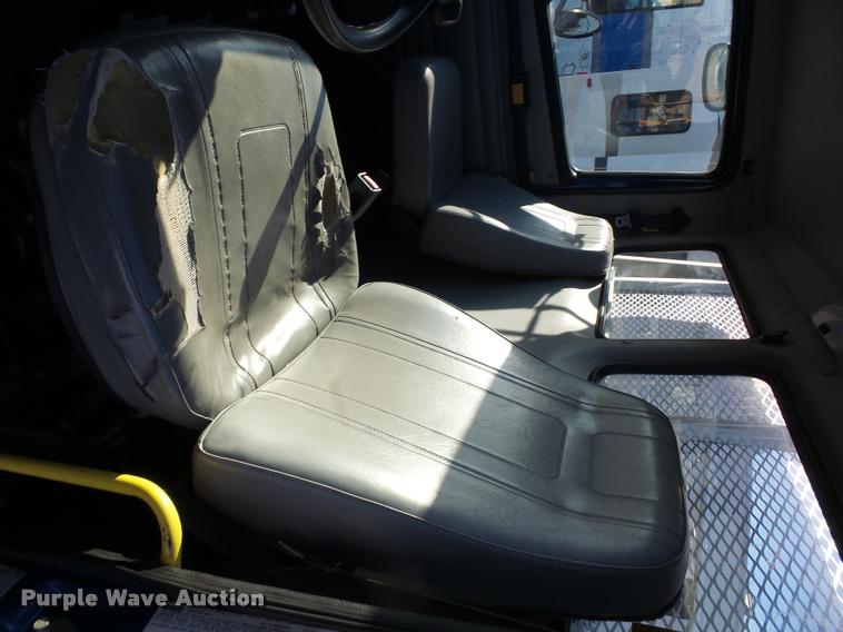 image for item AX9047 2002 Freightliner FL60 flatbed truck