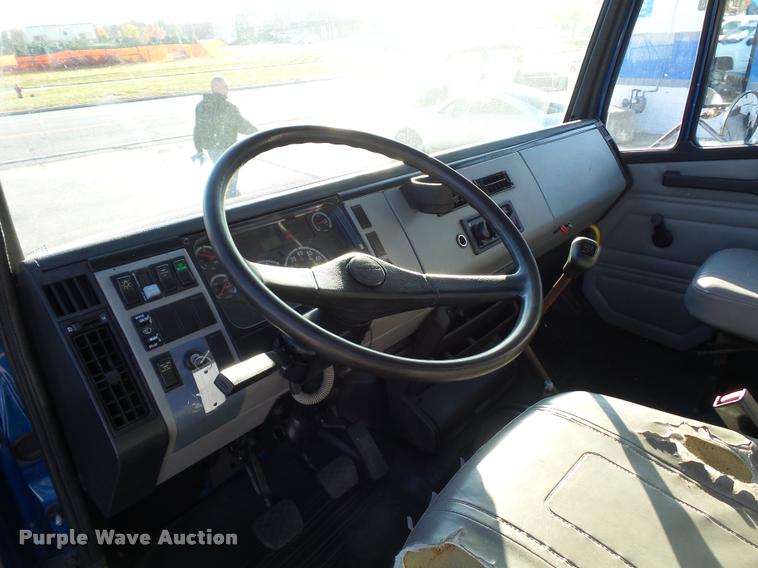 image for item AX9047 2002 Freightliner FL60 flatbed truck