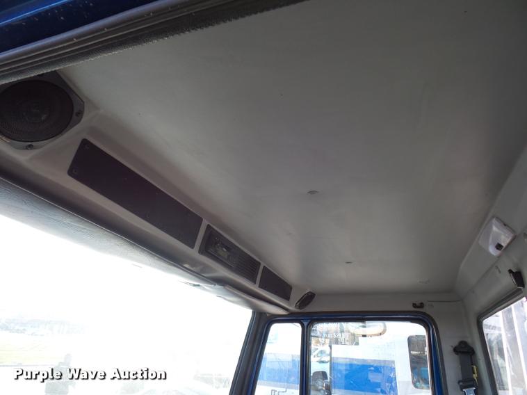 image for item AX9047 2002 Freightliner FL60 flatbed truck