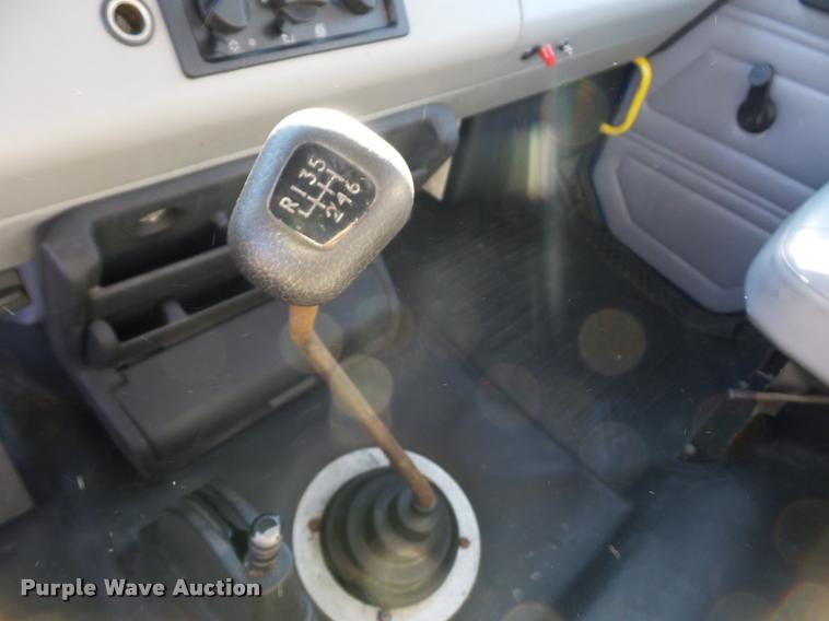 image for item AX9047 2002 Freightliner FL60 flatbed truck