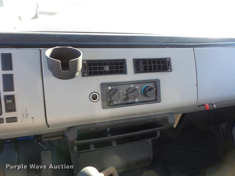 image for item AX9047 2002 Freightliner FL60 flatbed truck