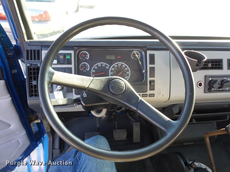 image for item AX9047 2002 Freightliner FL60 flatbed truck