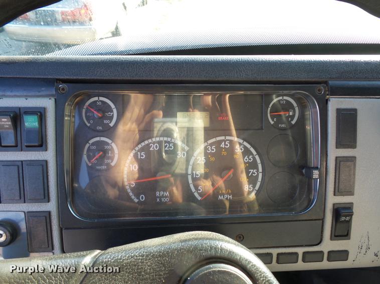 image for item AX9047 2002 Freightliner FL60 flatbed truck