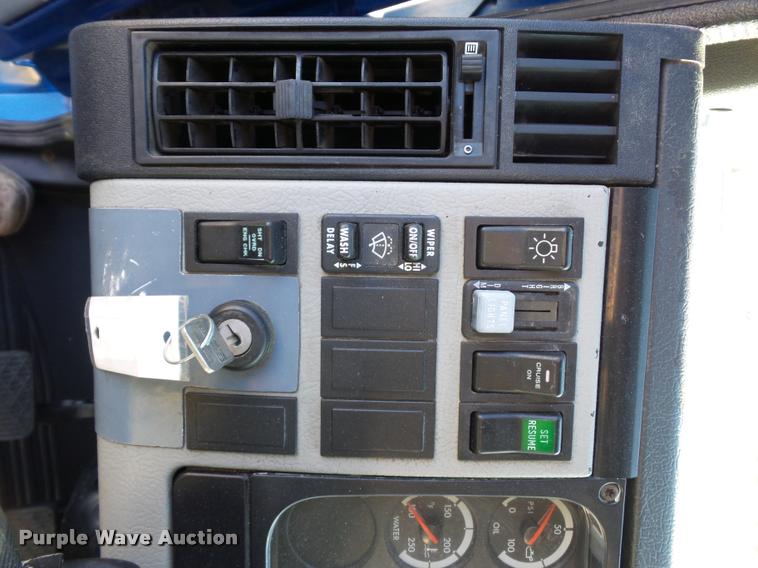 image for item AX9047 2002 Freightliner FL60 flatbed truck