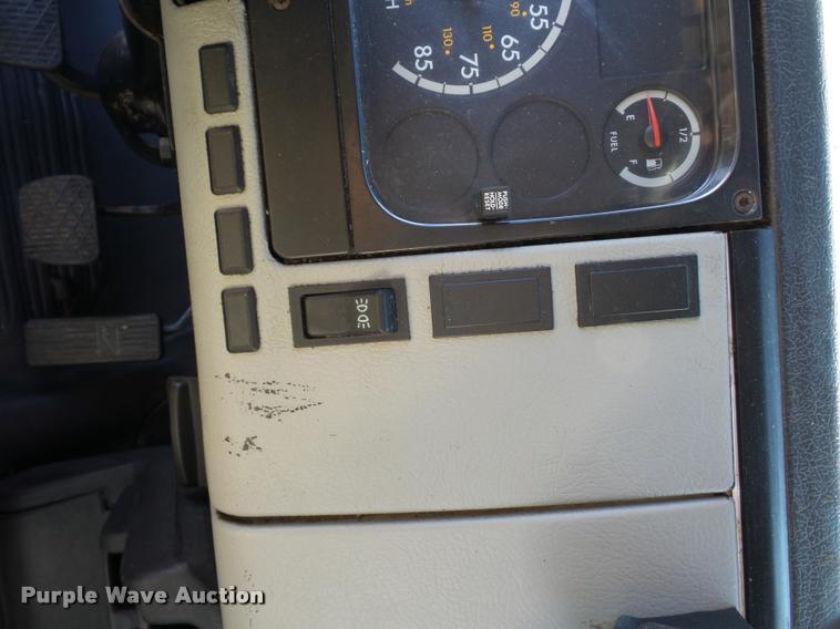 image for item AX9047 2002 Freightliner FL60 flatbed truck