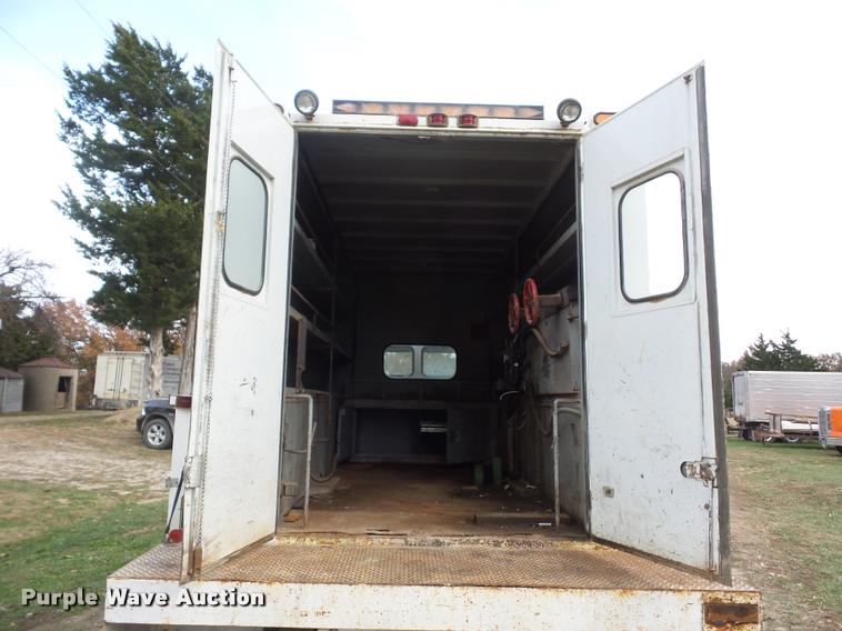 image for item BG9545 1999 Freightliner FL70 utility truck